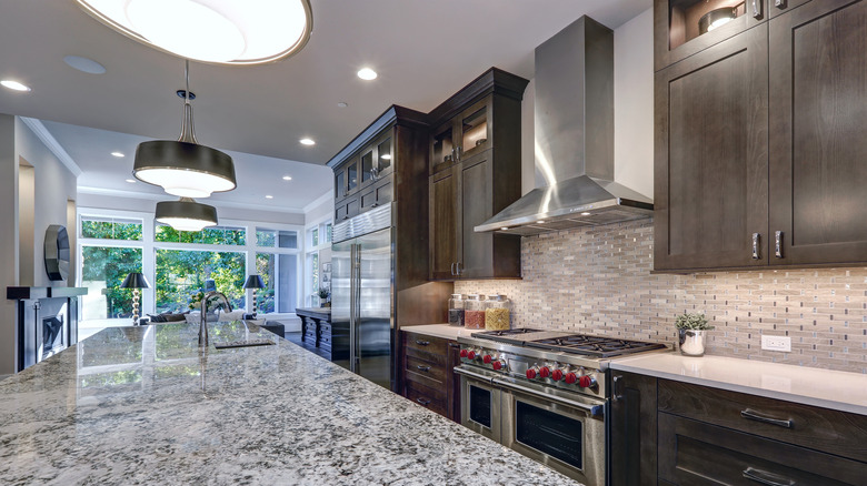 metallic and beige kitchen backsplash