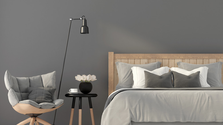 bedroom with dark gray walls