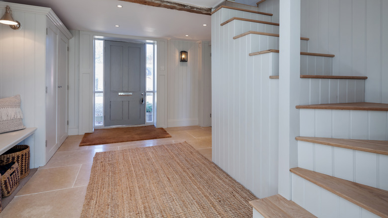 entryway with eggshell blue walls