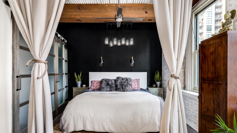 bedroom with wood beam 