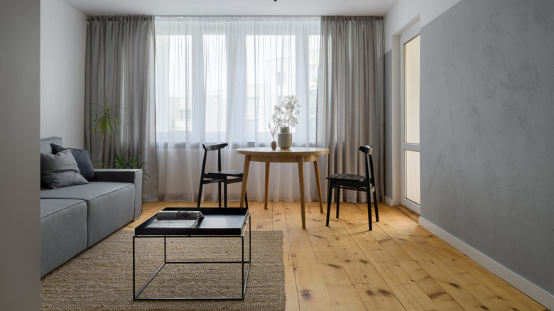 living room with pine flooring 