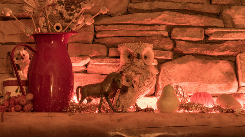 Fake owls on mantel