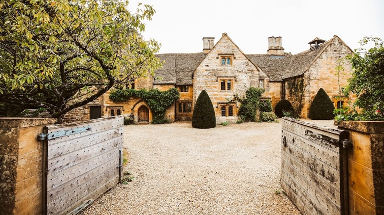 old mansion with wood gate