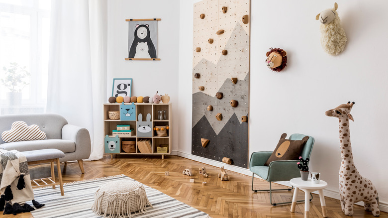 room with a rock climbing wall 