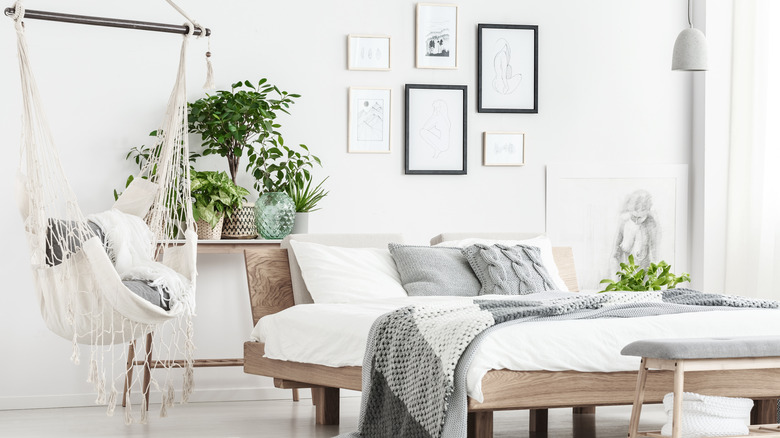 Bedroom with hammock chair swing