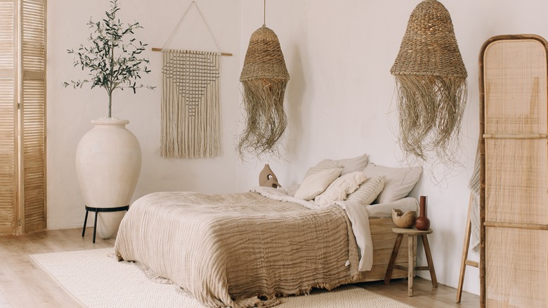 Neutral boho bedroom with vase