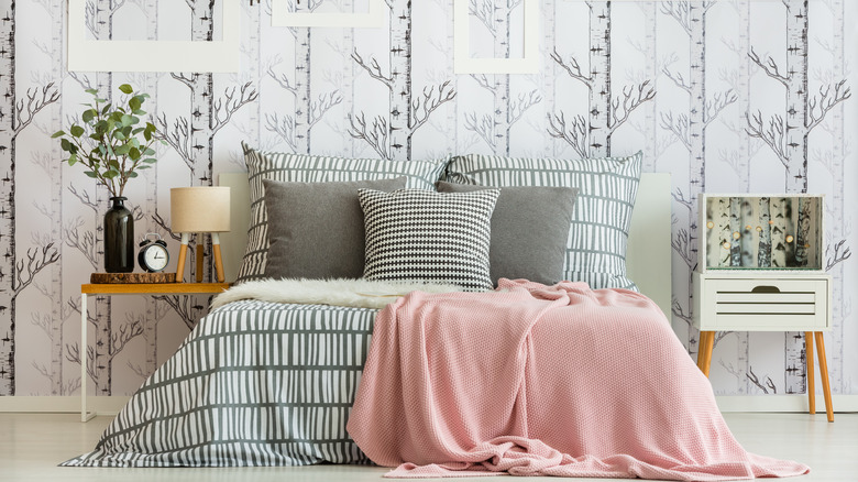 a bedroom with relaxing wallpaper