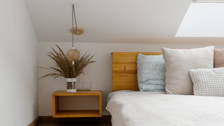 Bed with floating nightstand