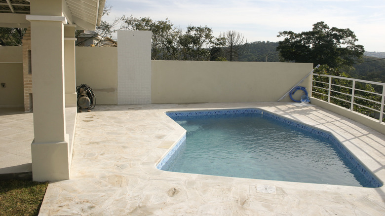 small pool with a patio