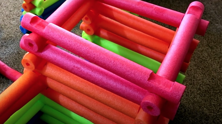 large pool noodle Lincoln Logs