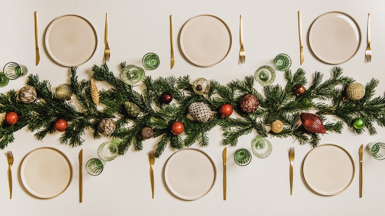 garland centerpiece on set table