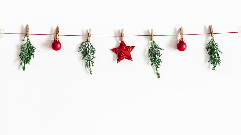 branches and ornaments on string