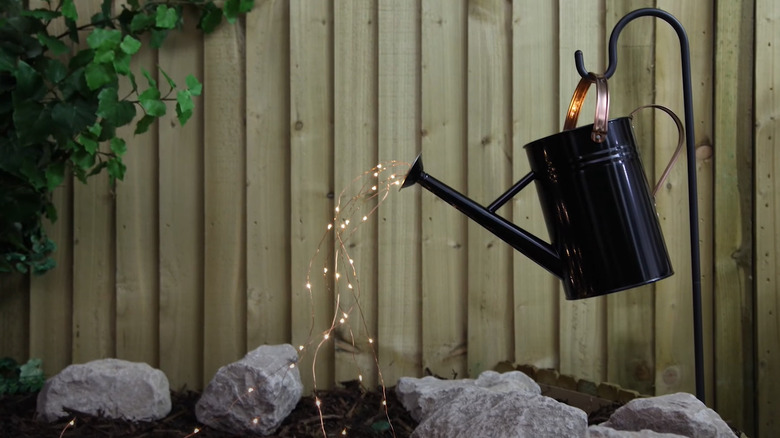 watering can with LED threads