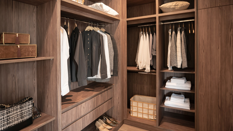 inside a wooden walk-in closet