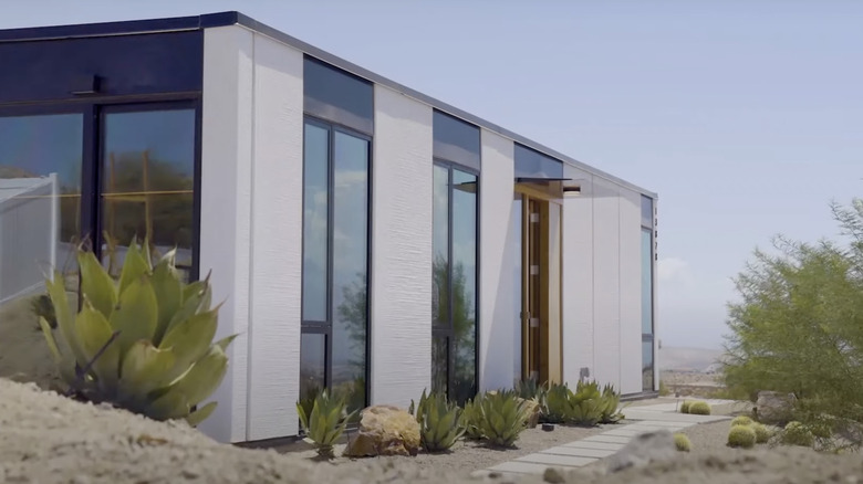 white modular home in desert