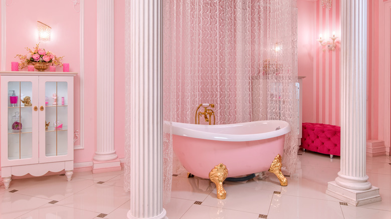 all pink bathroom with tub