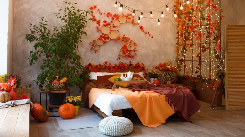 Bedroom covered in fall décor