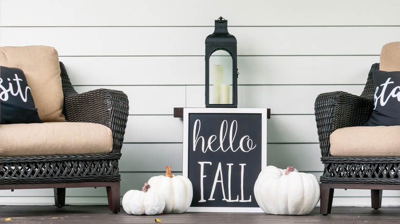 Porch seating with fall signs