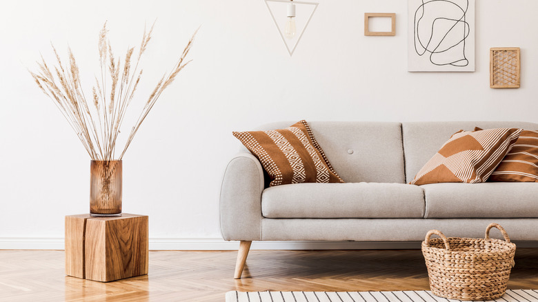 patterned pillows on gray sofa