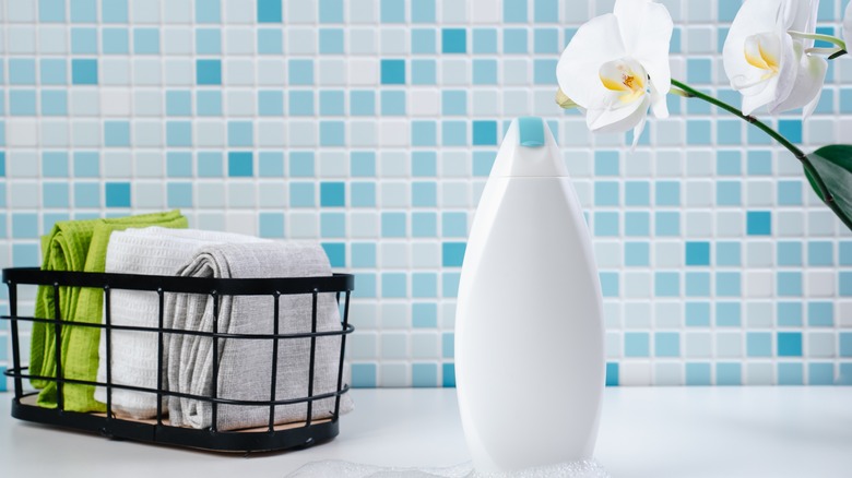 Blue and white tile with orchid