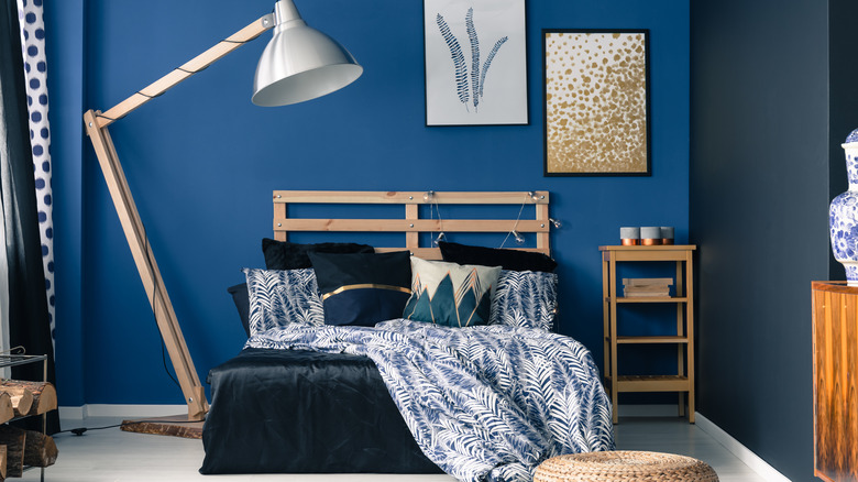 bedroom with rich blue walls