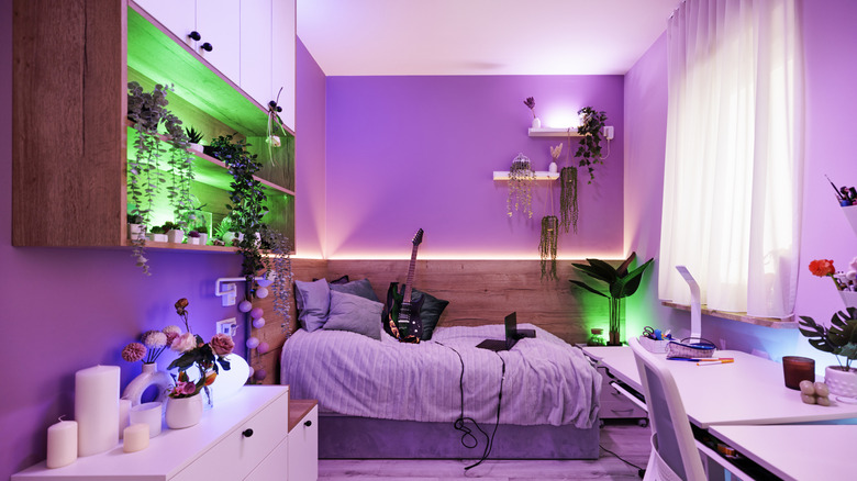 Bedroom with a pastel pink ceiling and purple walls