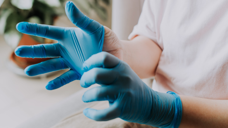 Close-up of gloved hands