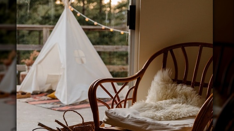 Room with balcony tent backdrop