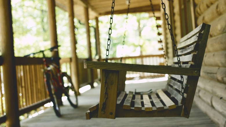 Chains suspended wooden swing