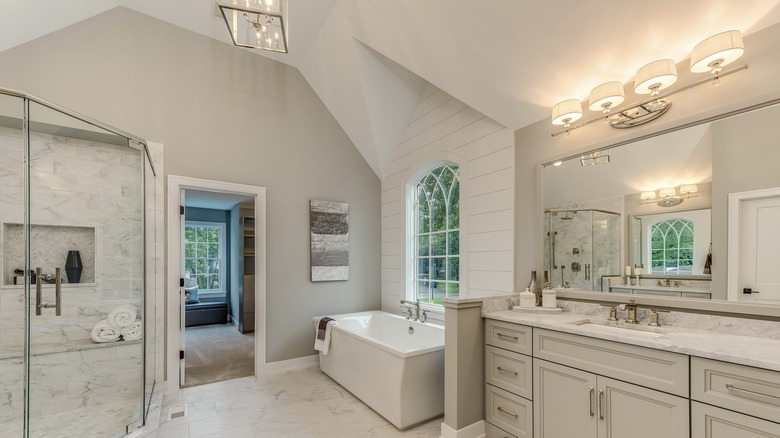 bathroom with angled ceiling