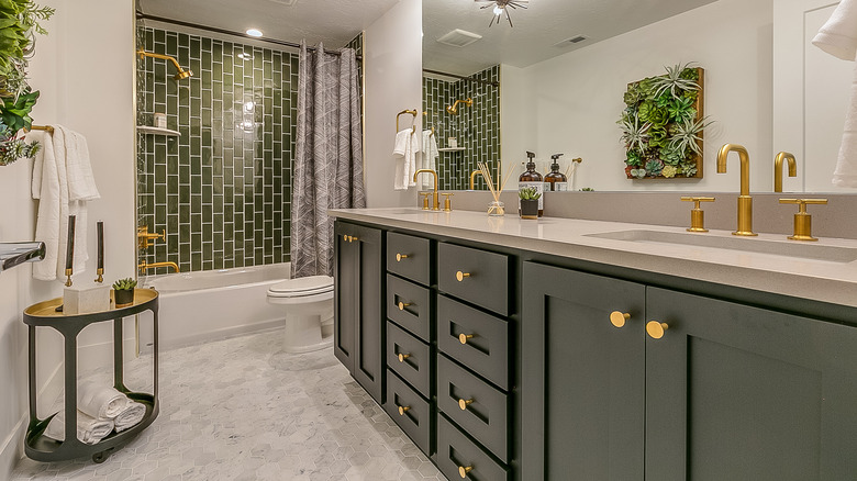 bathroom with green and gold