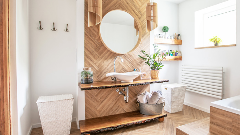 bathroom with wood accents