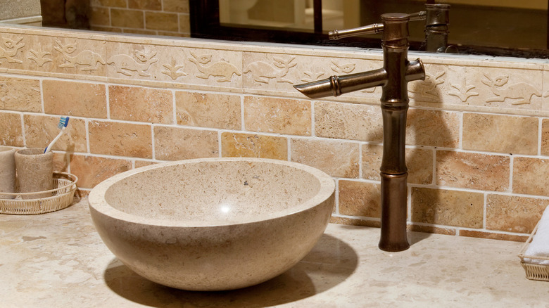 marble sink with a tap