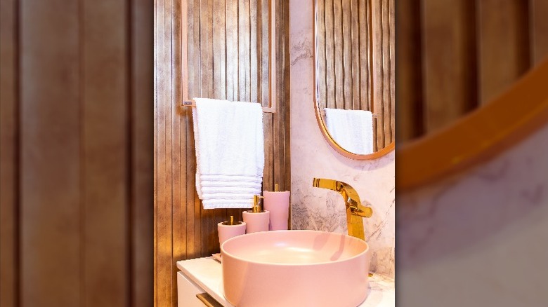 Pink and gold bathroom decor