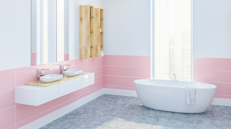 White bathroom pink bottom tiles