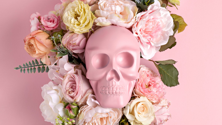 pink skull surrounded by flowers