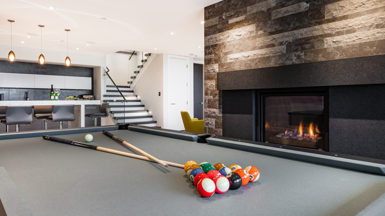 Game room with fireplace 