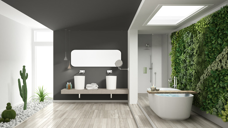 Chic bathroom with living wall and skylight