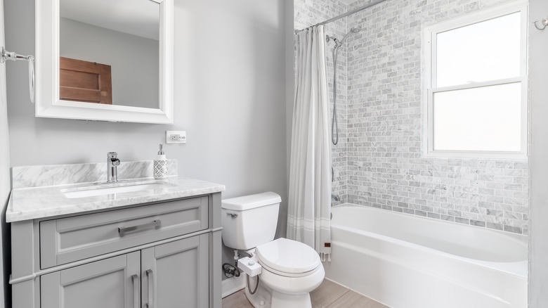 Gray bathroom with marble vanity