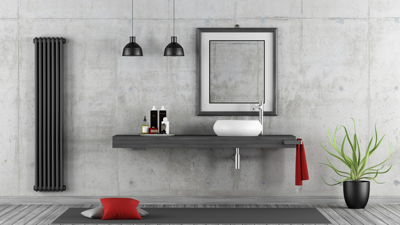 Industrial bathroom with concrete walls