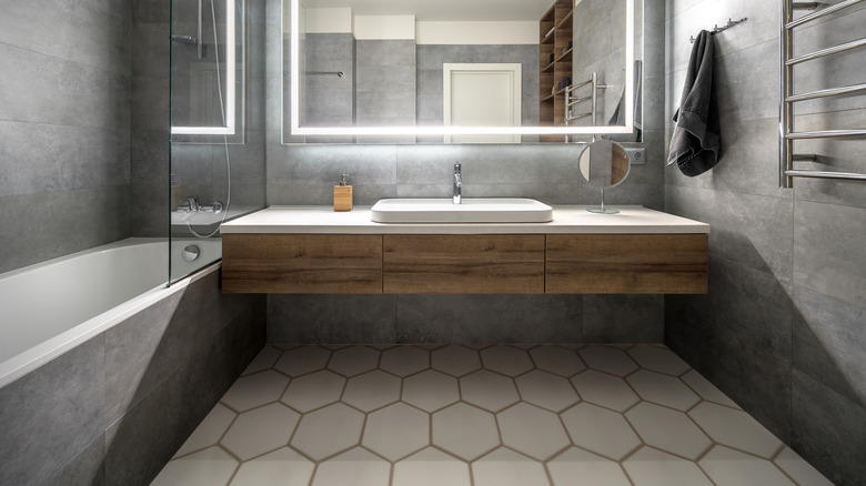 Gray bathroom with hexagon tiles