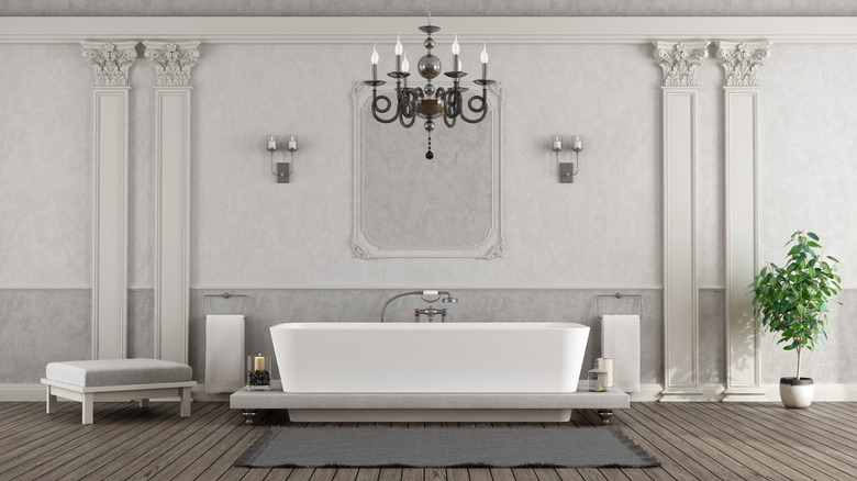 Gray and white bathroom with ornate accents