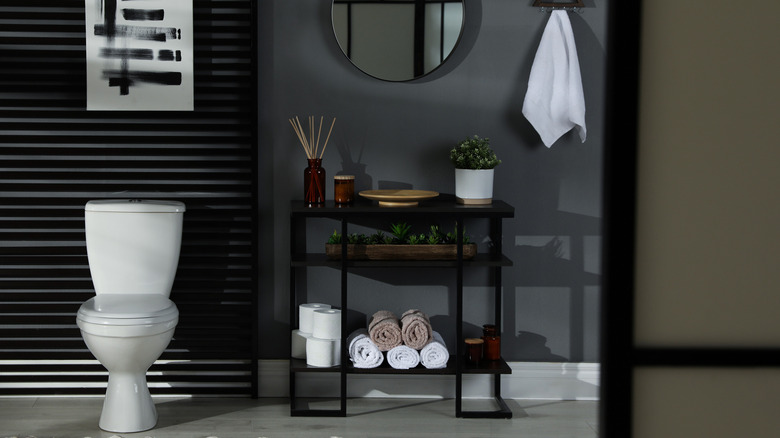 Small bathroom with dark gray paint