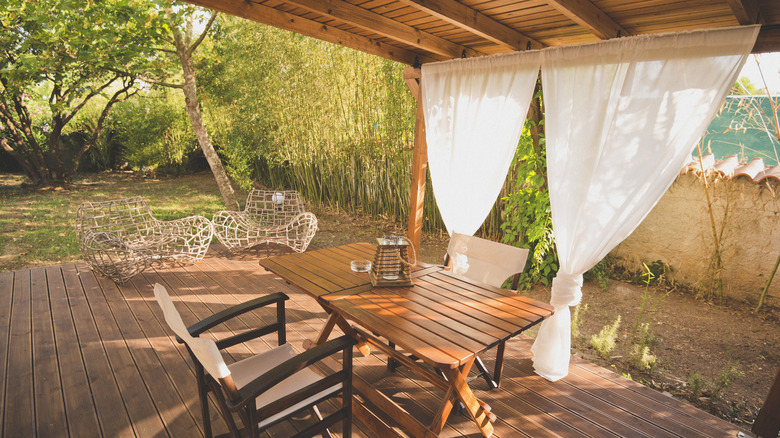 wood deck with curtains