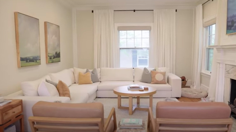 White living room with fireplace