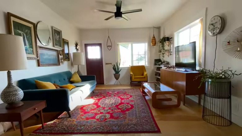 Living room with red rug