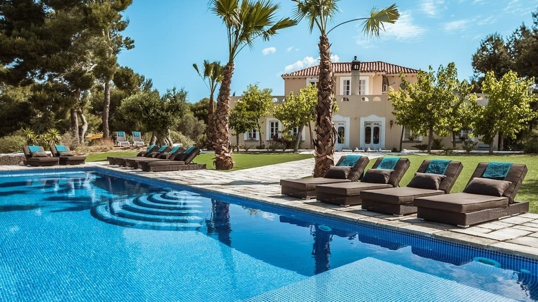 old mansion with a pool