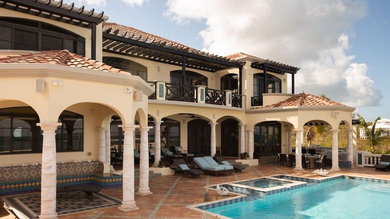 Spanish-tiled mansion with pool