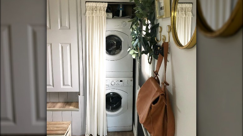 Washer dryer stacked curtain