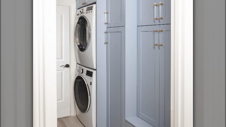 Sky blue laundry room cabinets